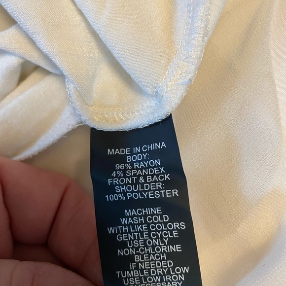 Sleeveless cream tunic in gently used condition - Picture 2 of 4